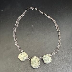 Elegant Silver Necklace with Textured Pendants